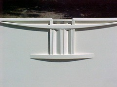 Close-up Mackintosh inspired headboard.